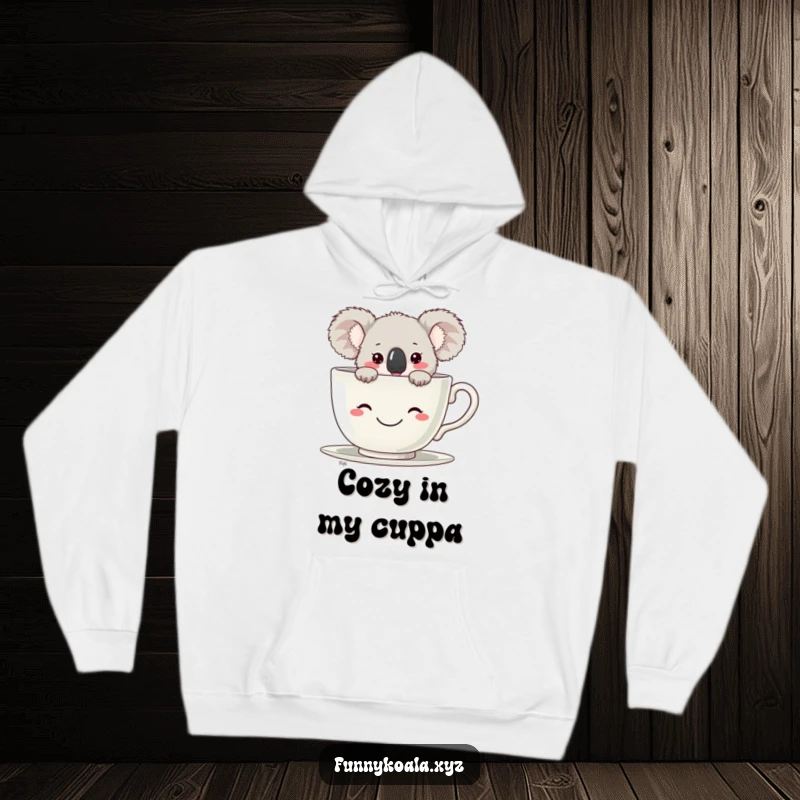 Funny Koala Hoodie showing a koala peeking from a large teacup, ensuring warmth and a good laugh. Wonderful funny gift.