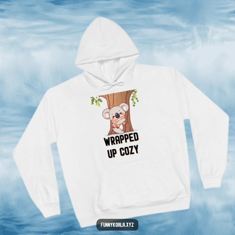 Funny Koala Hoodie: A koala in a scarf enthusiastically hugs a tree trunk, offering cozy comfort and a humorous design.