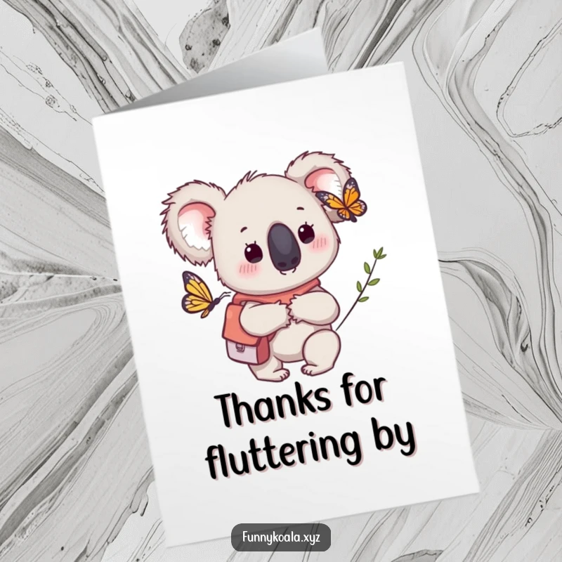 Funny free printable thank you card showing a koala with a tiny backpack curiously looking at a butterfly, expressing thanks.