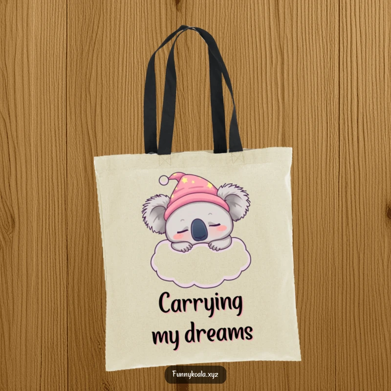 Funny sleepy koala tote bag showing a koala in a nightcap snoozing on a fluffy cloud, perfect for carrying essentials.